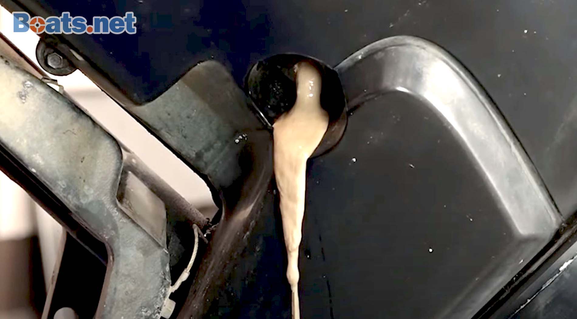 Milky outboard gearcase oil