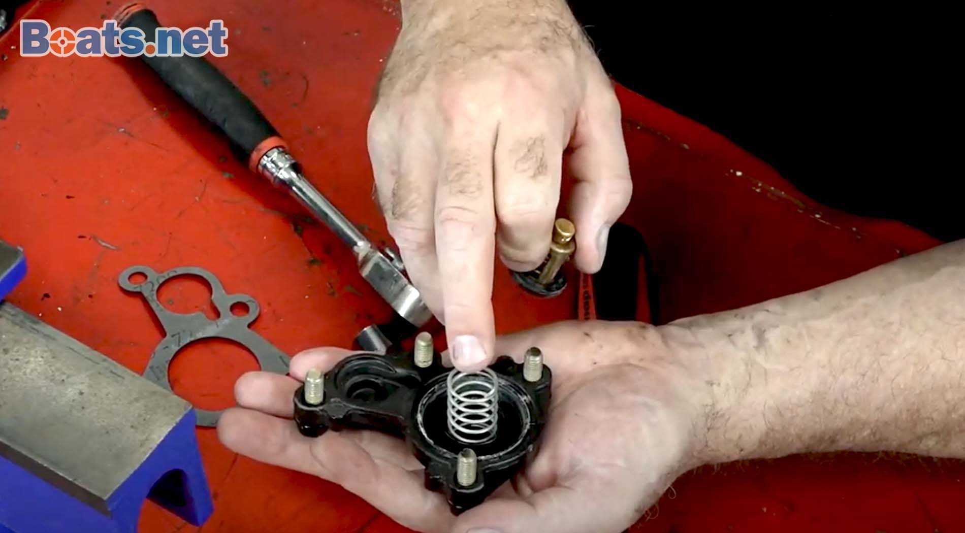 How to replace an outboard thermostat