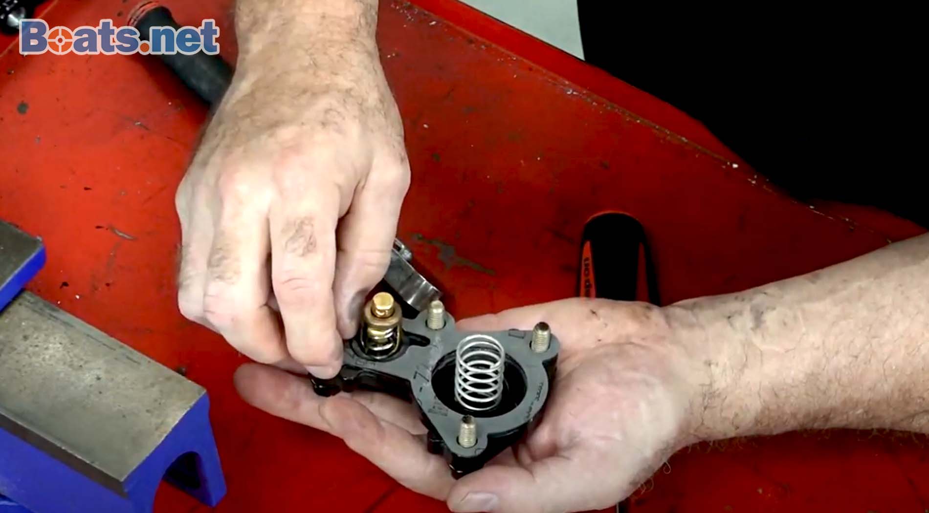How to replace a Mercury outboard thermostat
