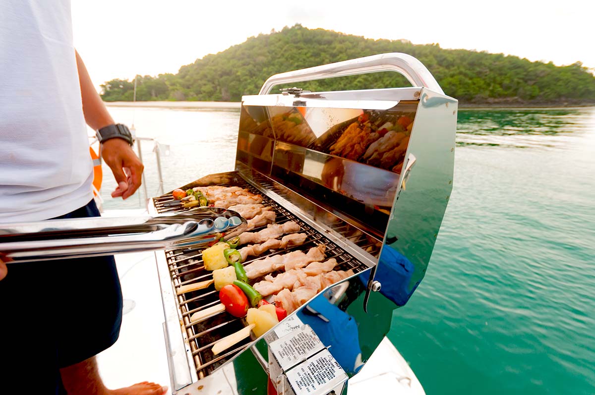 Grilling food on a boat