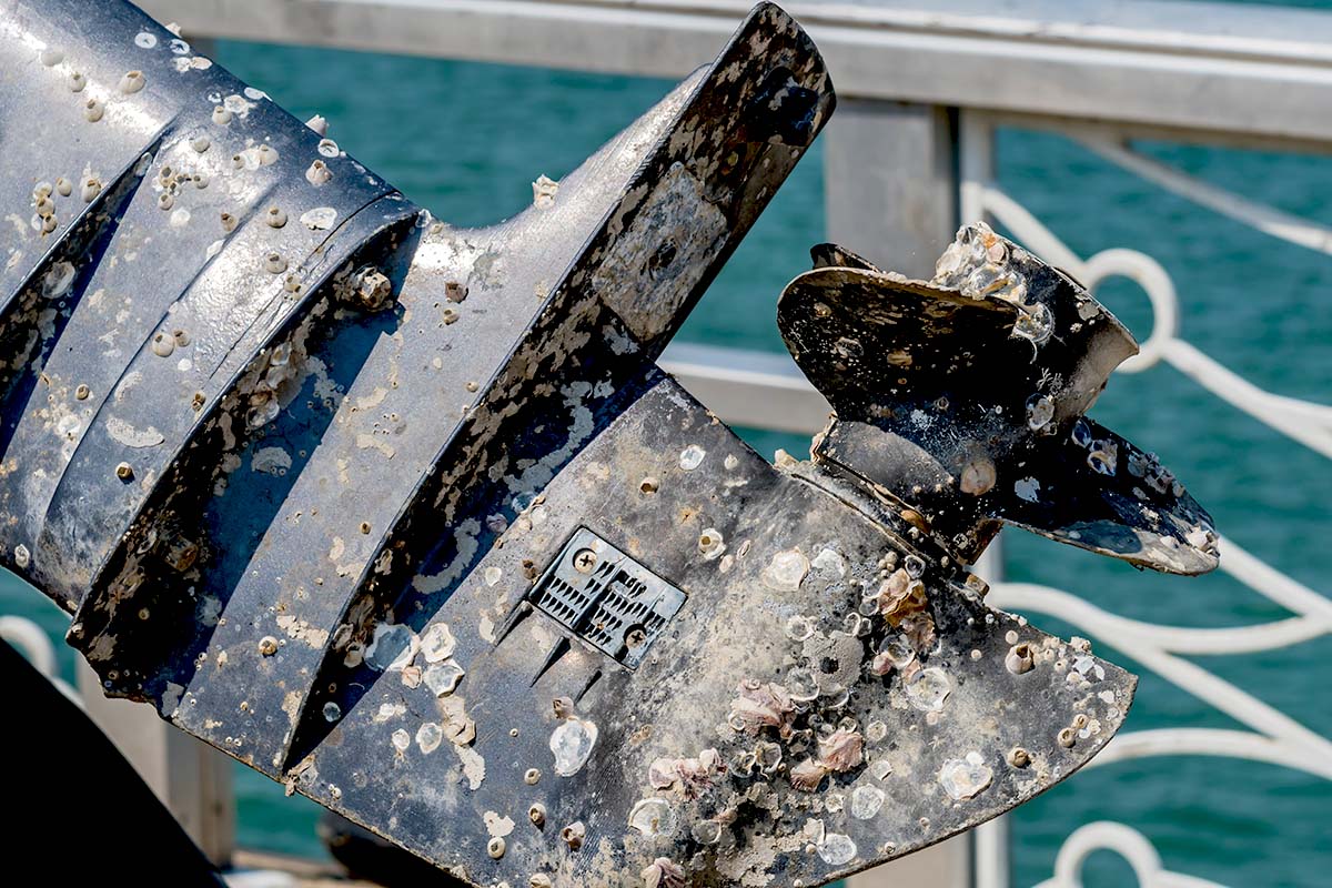 Why remove boat barnacles outboard